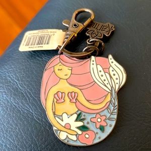 NEW in PKG ENAMEL MERMAID KEYCHAIN She’s in softer pastels, in multi-colors.